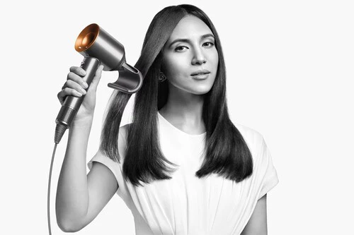 secador dyson mujer